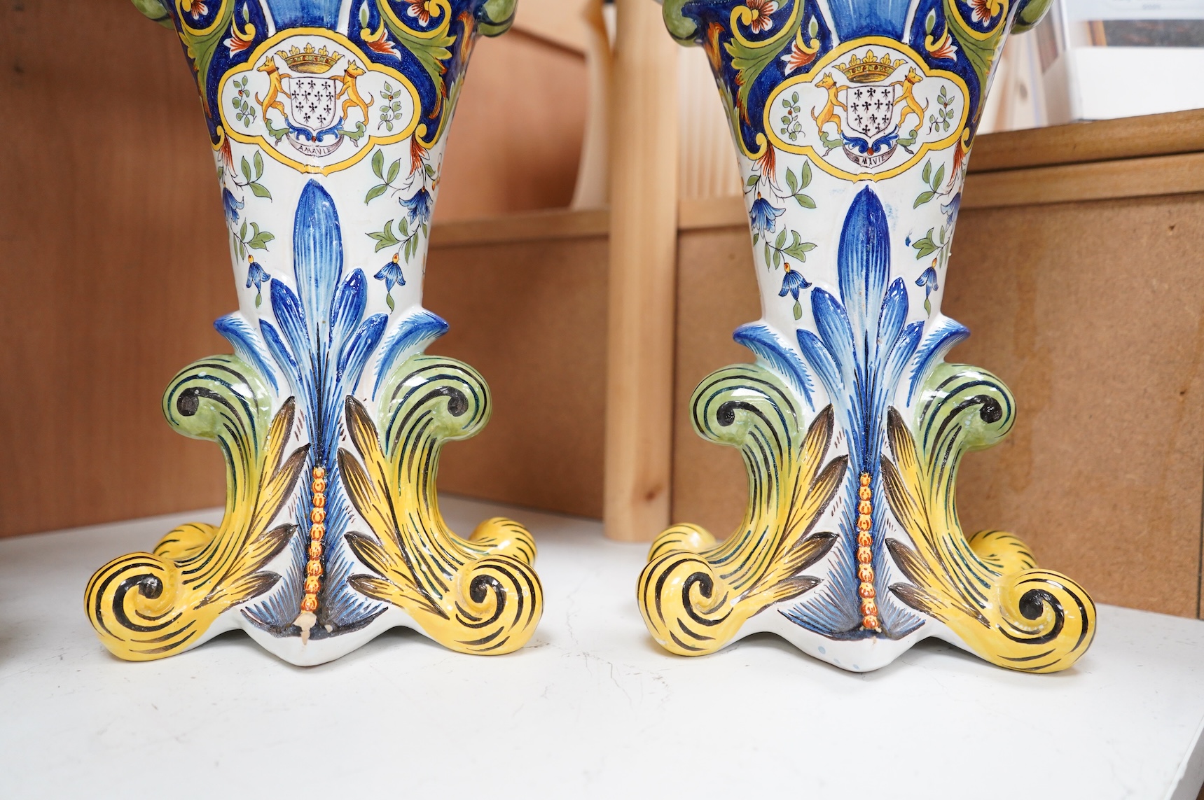 A pair of early 20th century French faience vases, 37cm high